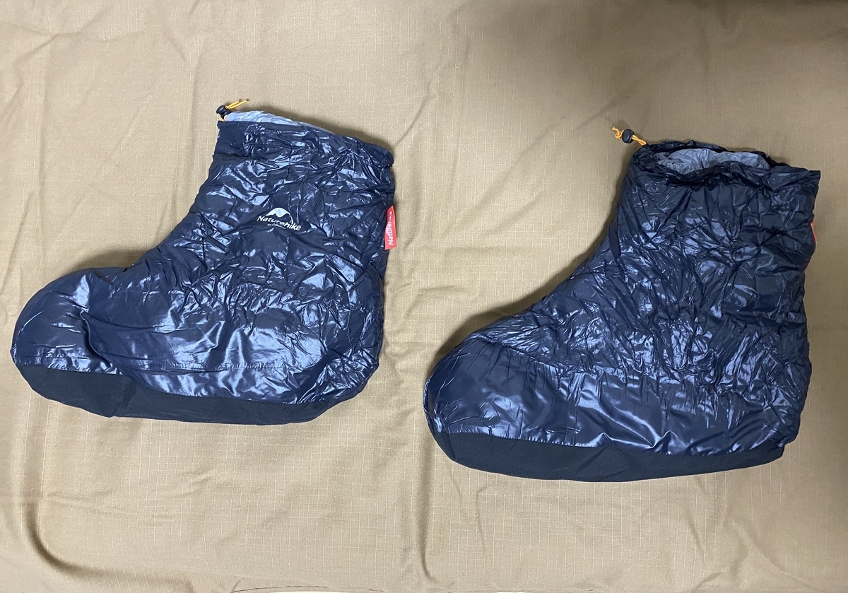 Down tent shoes side by side