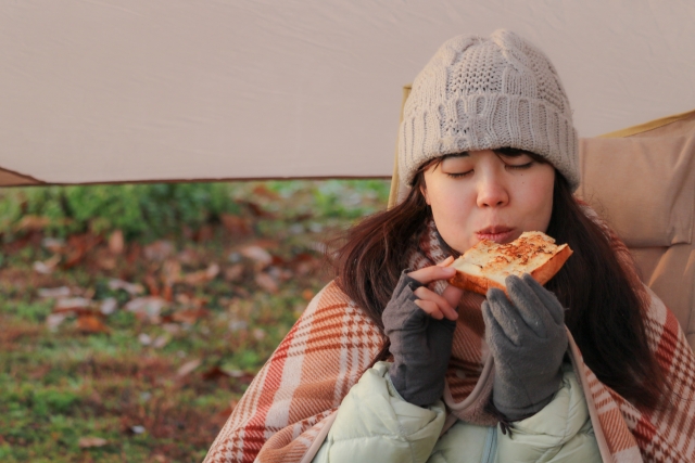 Woman keeping warm