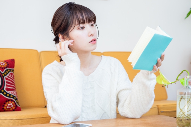 Woman writing TODO list
