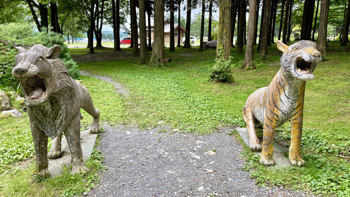 Lion and tiger statue