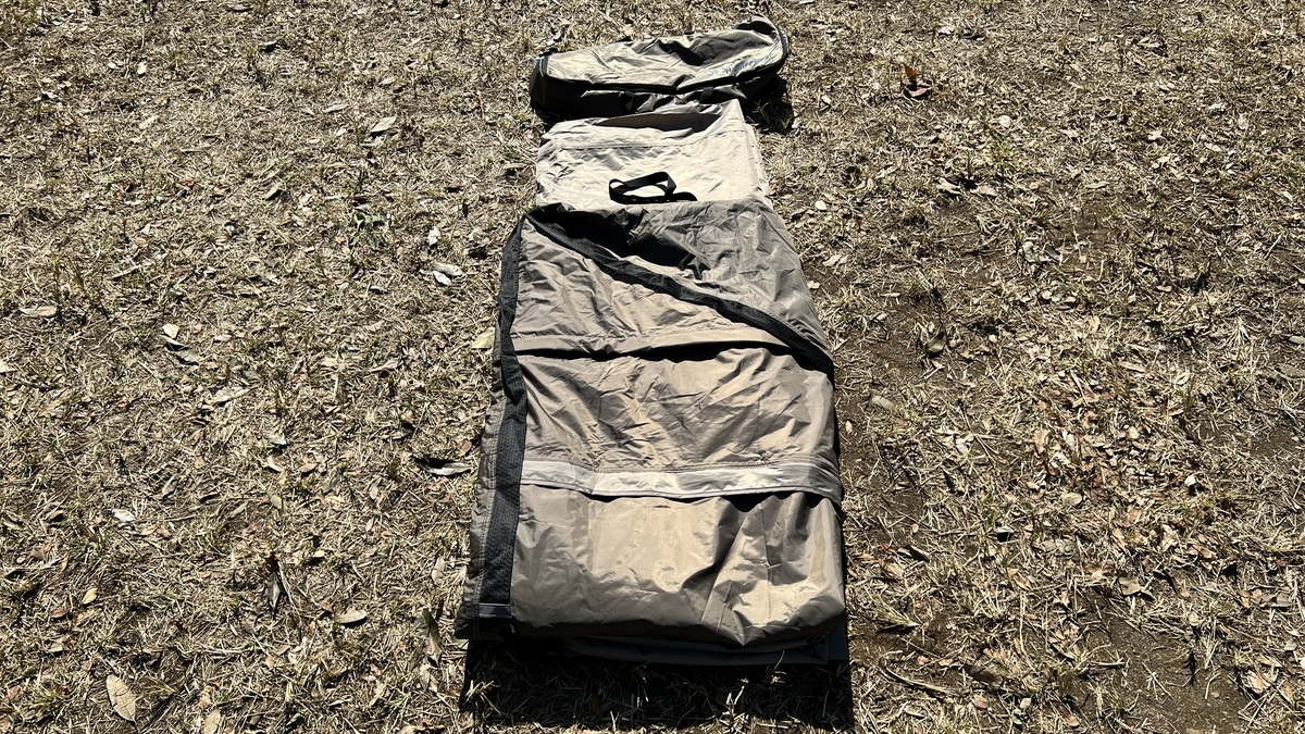Place the flysheet on top of the inner tent