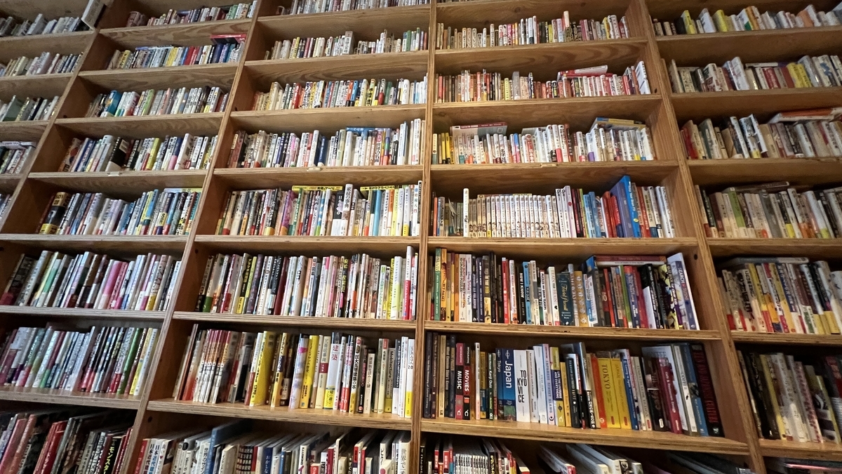 Wall of books spanning diverse genres