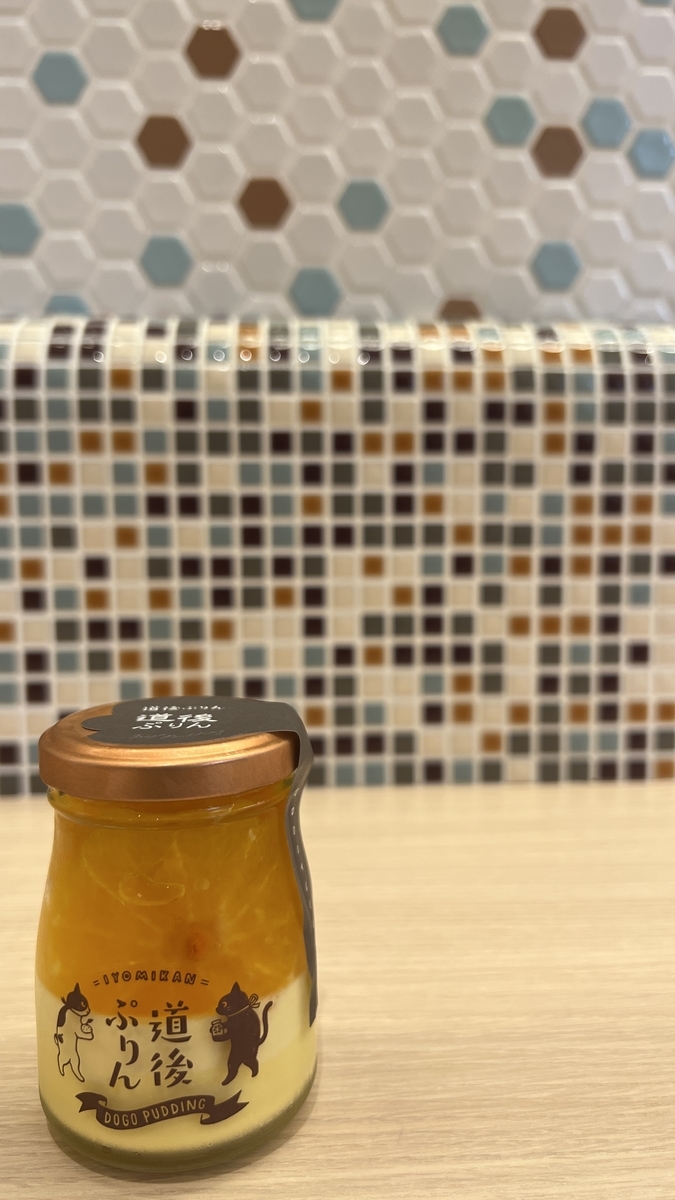 Dogo Pudding and its cute tile wall