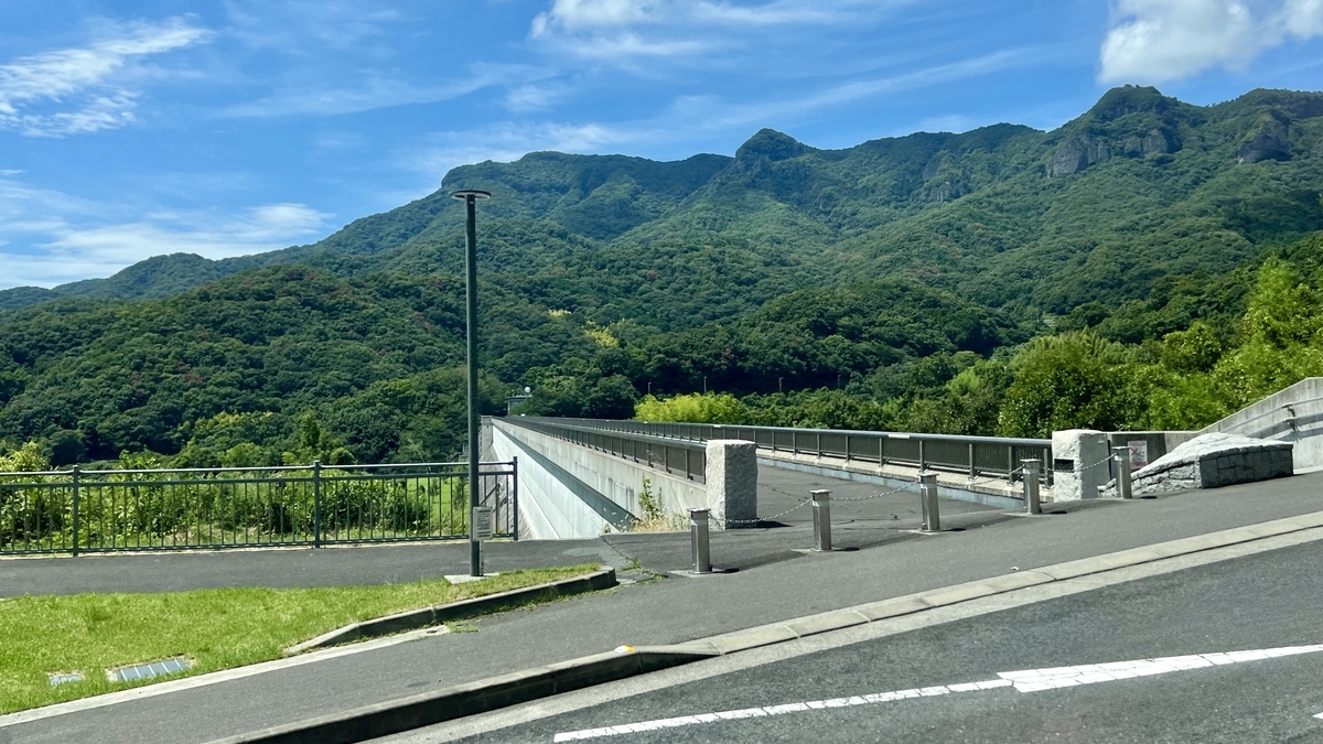 View of Uchinomi Dam and surrounding mountains on the way from Kusakabe Port to Kōuntei Station