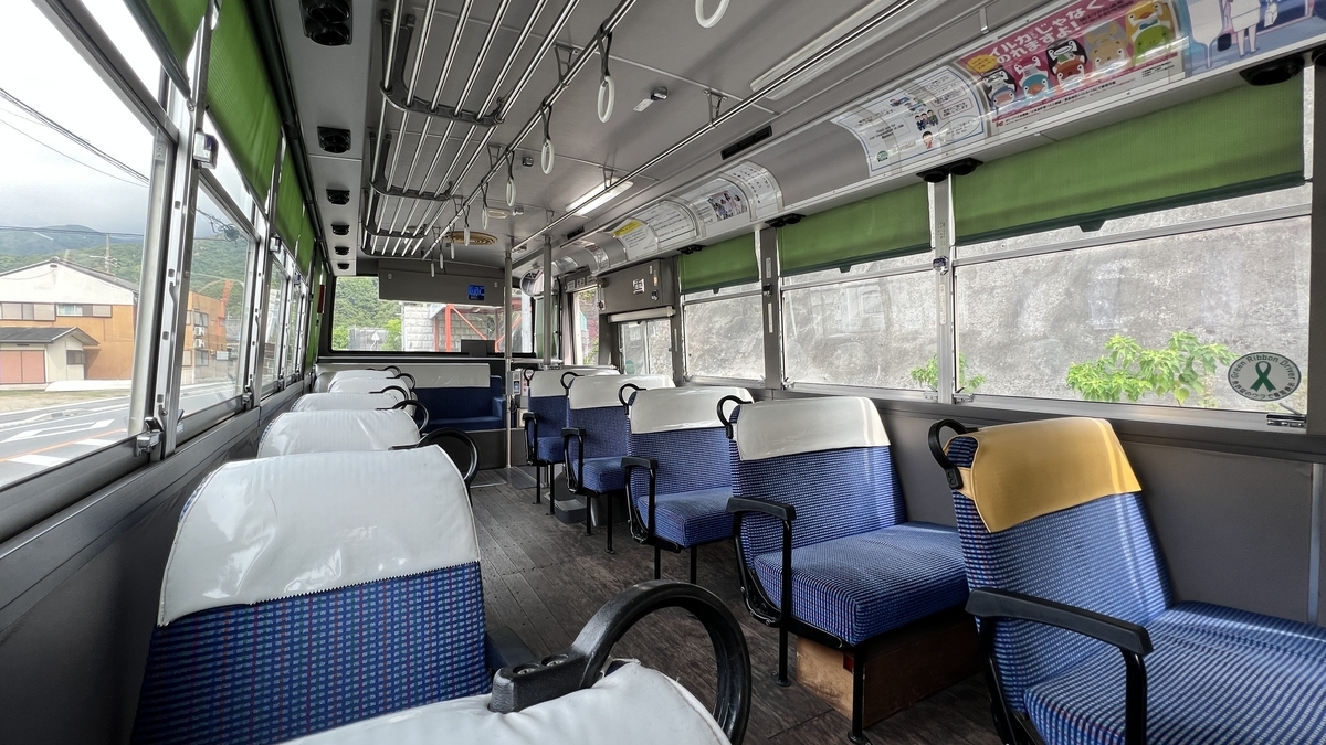 Wood-paneled interior of the bus, enhancing a vintage atmosphere.