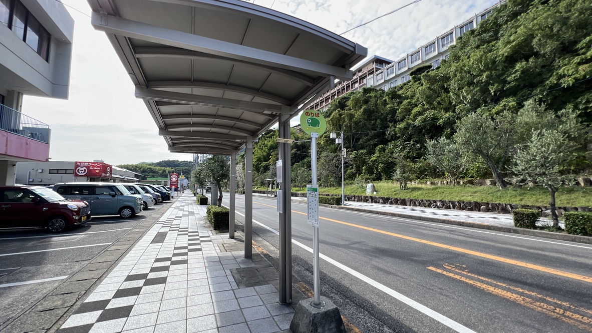 Bus stop in front of Kokusai Hotel and the road nearby.