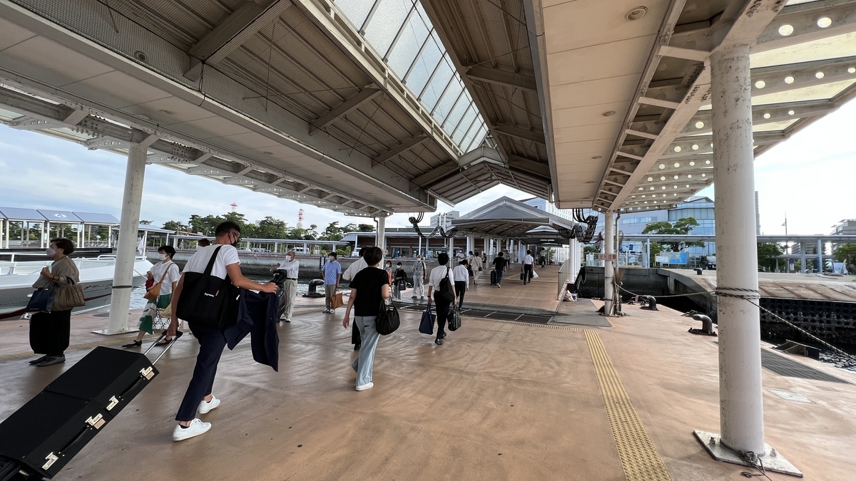 Passengers disembarking at the Takamatsu Port arrival deck.