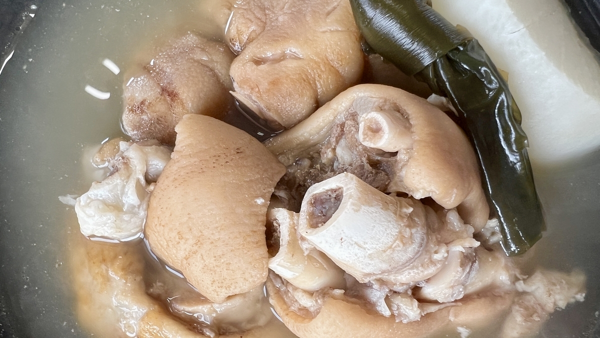 Bone-in pork trotters simmered in broth at Yoshimi Shokudo