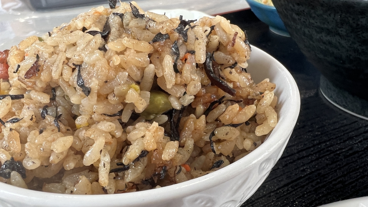 Jushi rice mixed with flavorful ingredients at Yoshimi Shokudo
