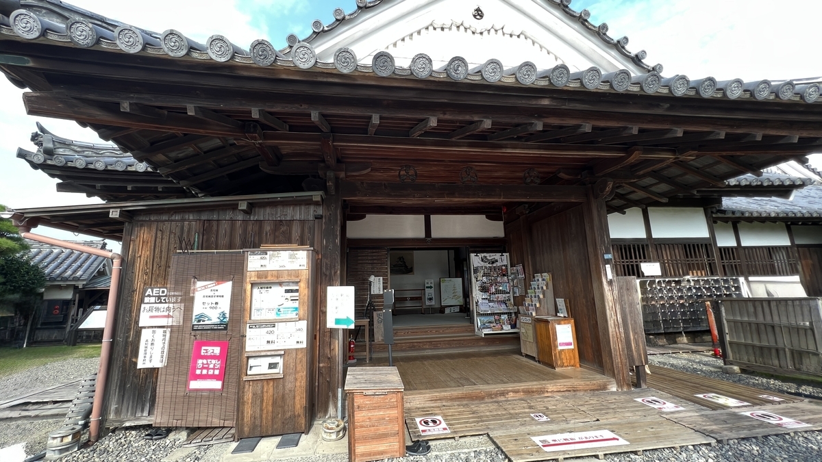 Entrance to Kaitokukan. The aged texture of the wood reflects the passage of time.