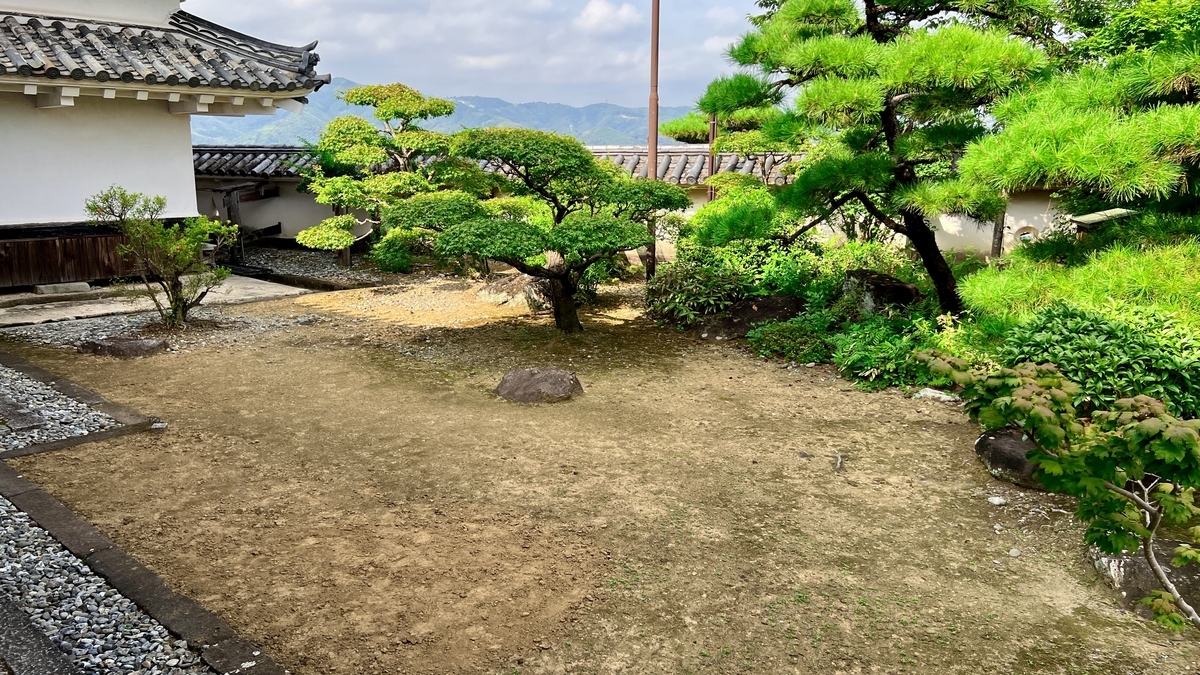 A small garden offers a peaceful resting area.
