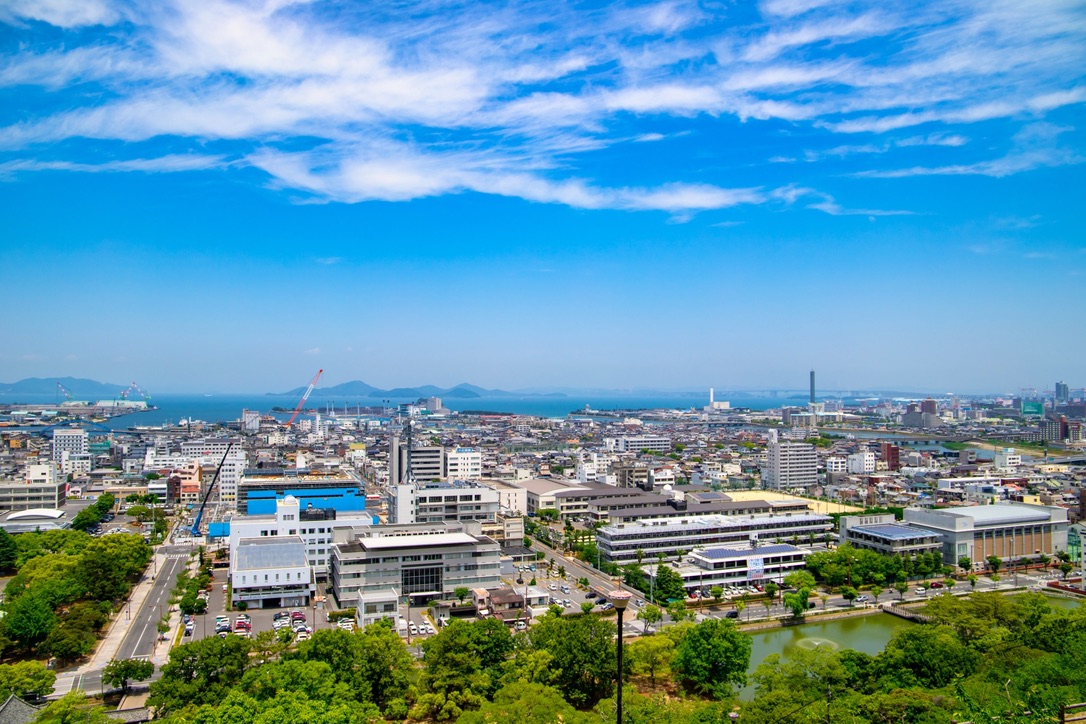 Panoramic view of Marugame City and the Seto Inland Sea seen from the main enclosure of Marugame Castle.