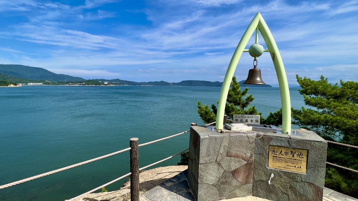 The love bell at Promised Hill Lookout with a view over the Seto Inland Sea