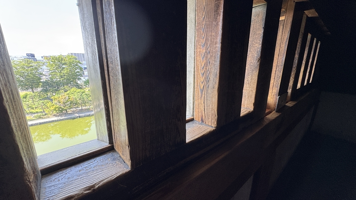 Wood-framed warrior window with view of the outside