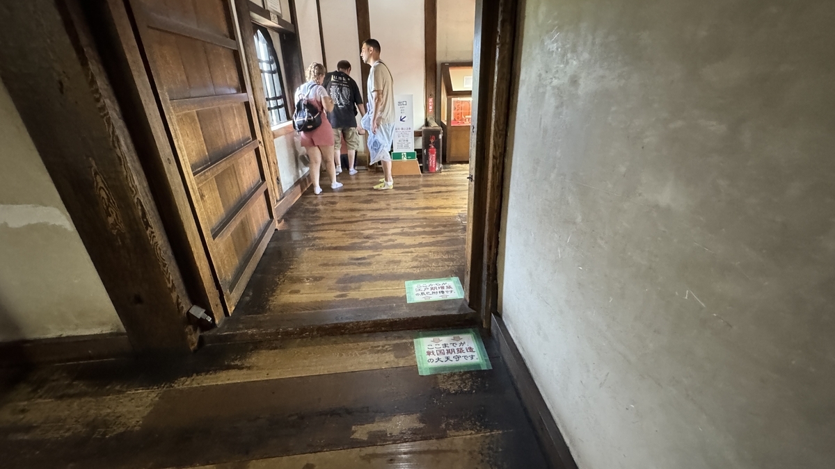 Corridor with floor marking the boundary between keep and turret