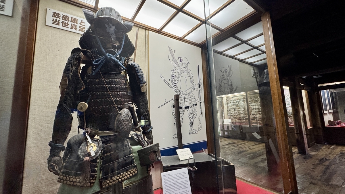 Exhibit with armor and swords inside the keep