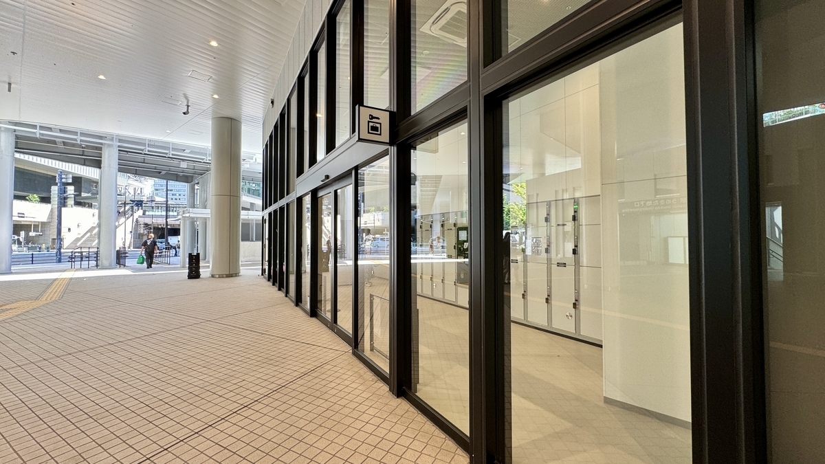 Glass door entrance to the coin locker area on the 1st floor of Umekita Green Place