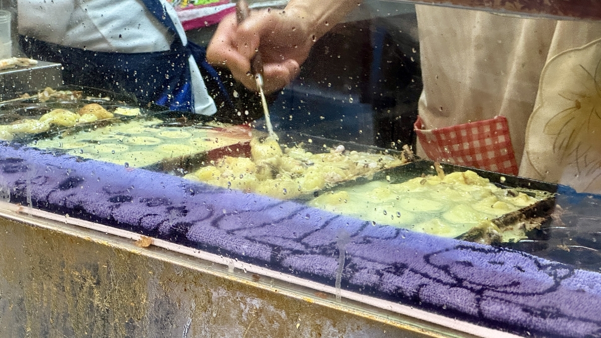 Soft, slowly cooking batter on the hotplate