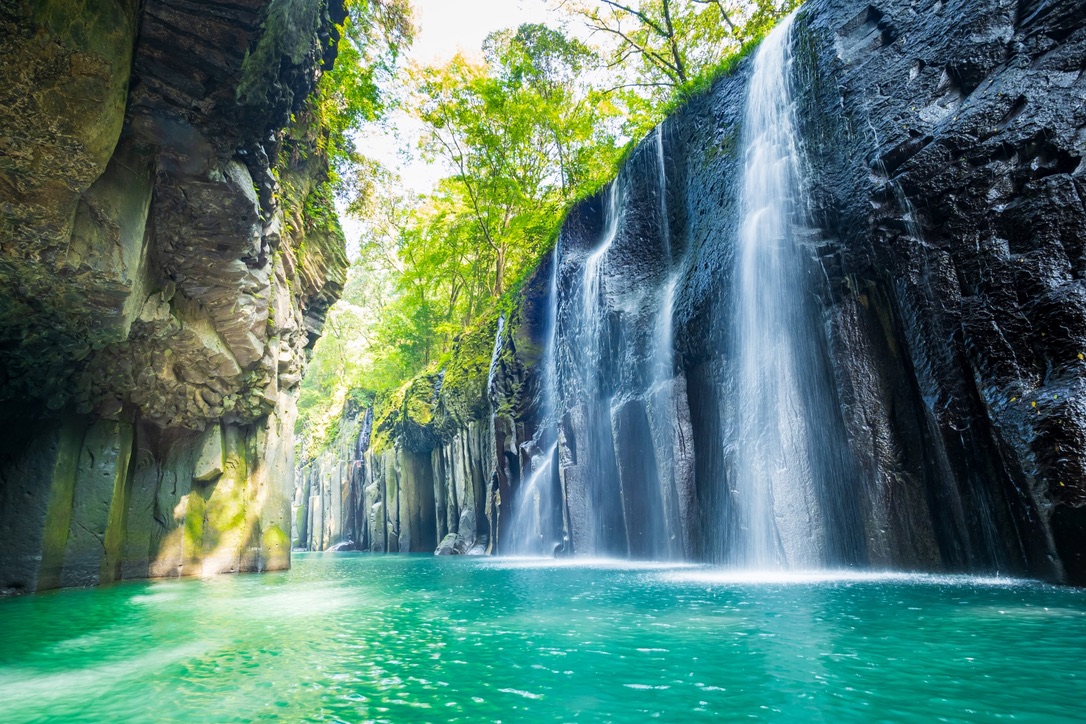 Manai Falls and columnar jointing rock walls at Takachiho Gorge