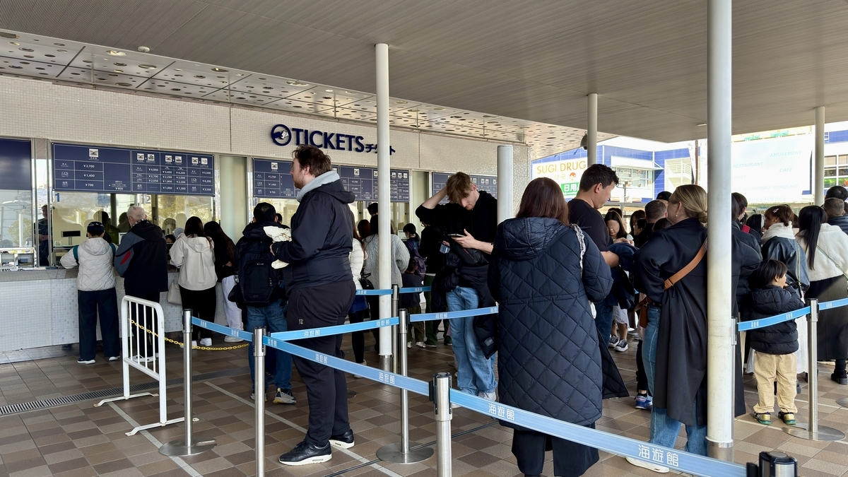Visitors waiting to purchase tickets at the Kaiyukan ticket counter