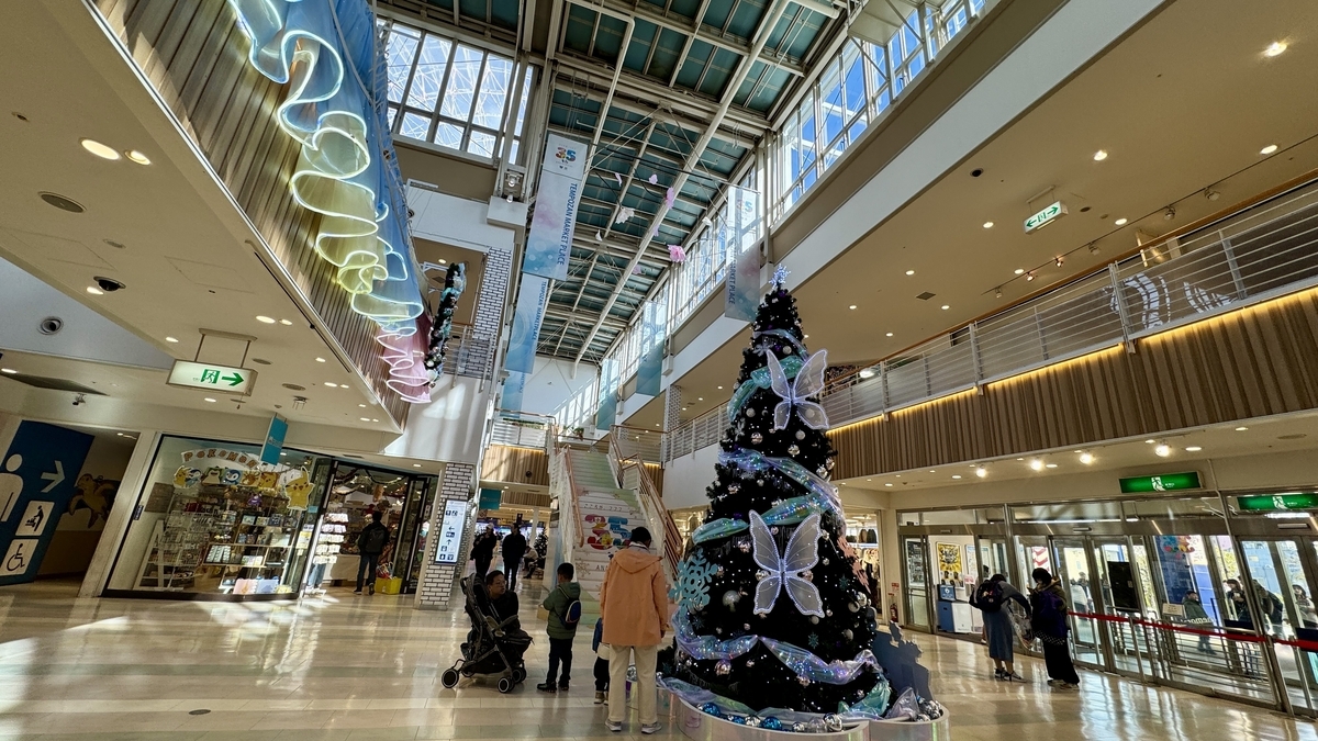Interior atrium and decorative tree inside Tempozan Marketplace