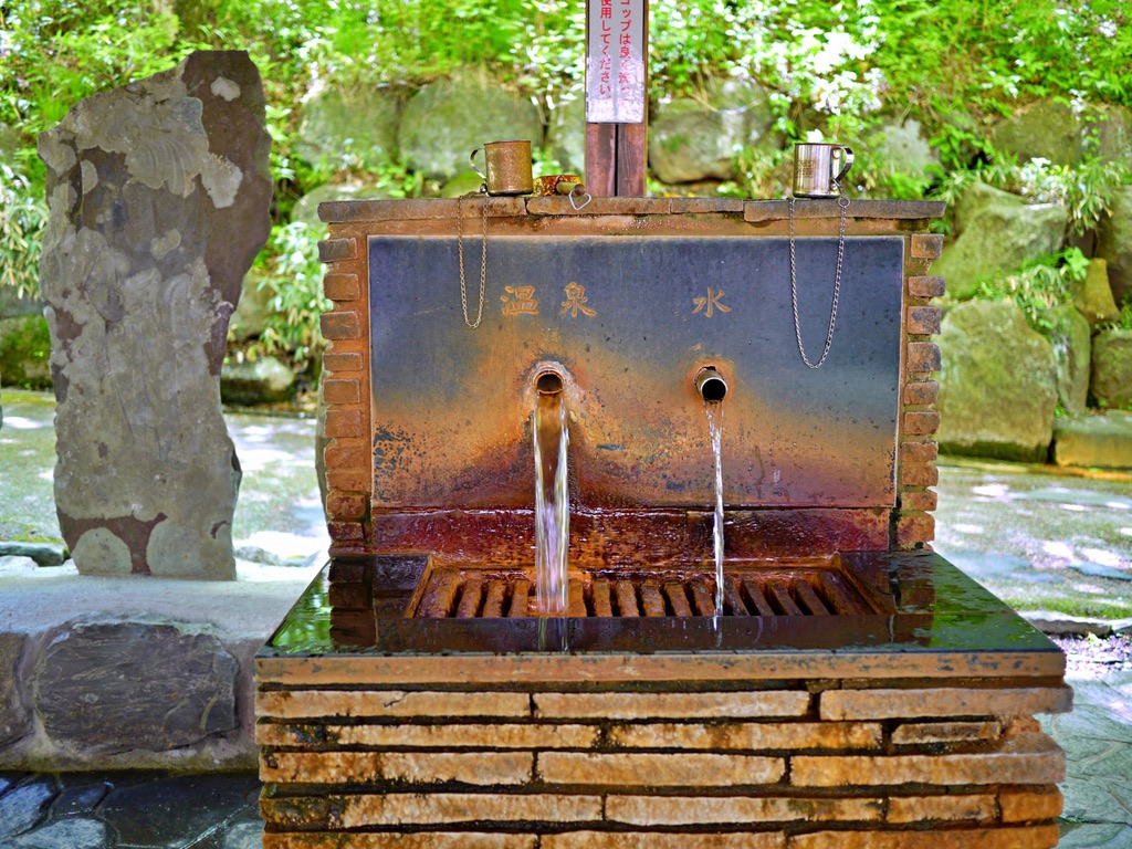 Outdoor drinking spring fountain where hot spring water flows