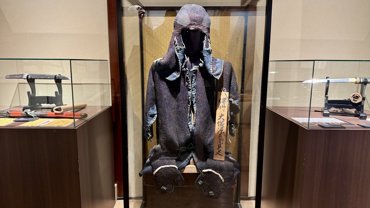 A display of ninja attire clad in chainmail